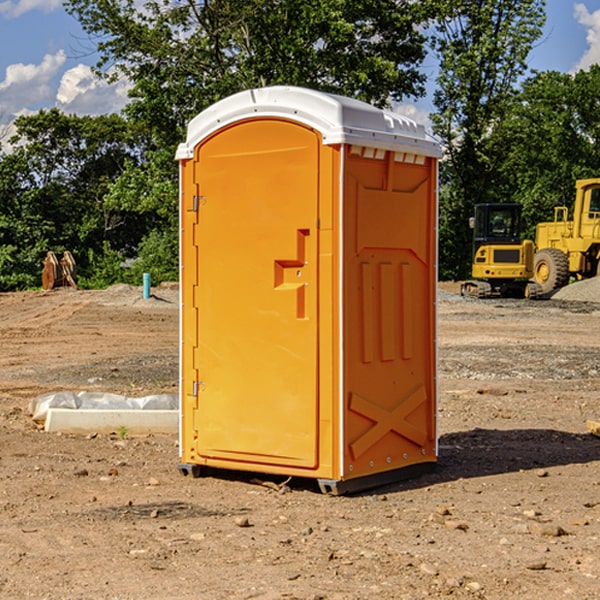 how often are the porta potties cleaned and serviced during a rental period in Loving